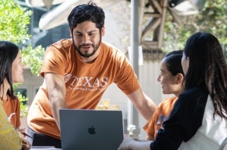 Adolfo gathered with other students