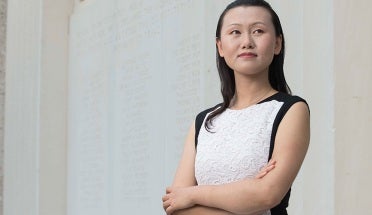 nanshu lu poses on campus