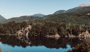 mountains near body of water during daytime